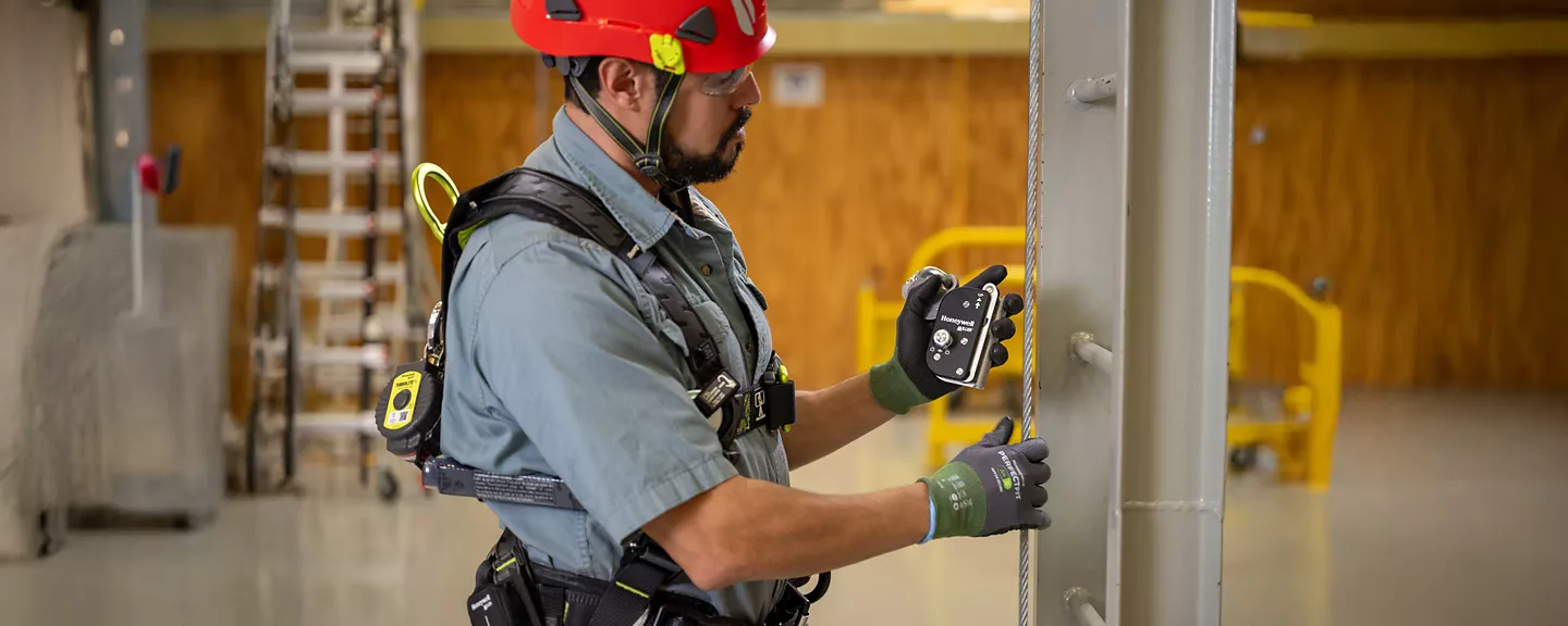 Worker in full PPE at height